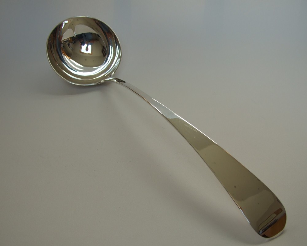A splendid Georgian Scottish silver soup ladle.