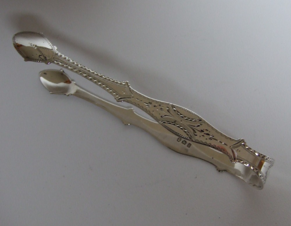 A superb pair of Bateman Family Georgian silver tongs.