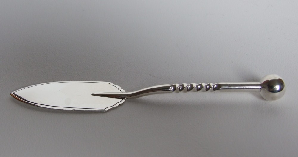 A lovely and unusual Victorian silver pate server.