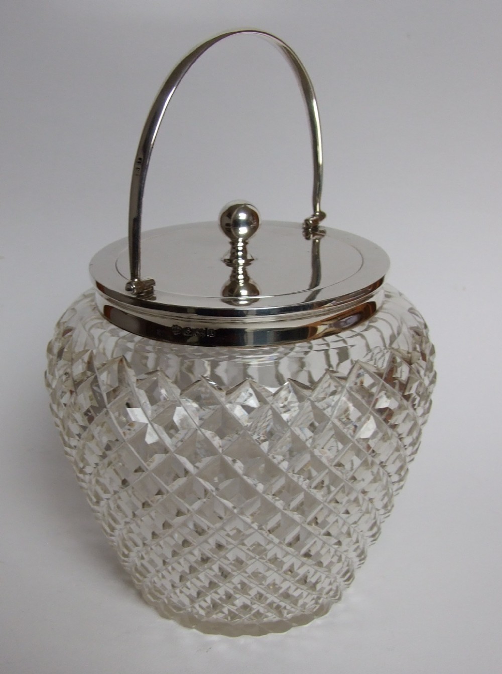 A handsome silver mounted Edwardian biscuit barrel.
