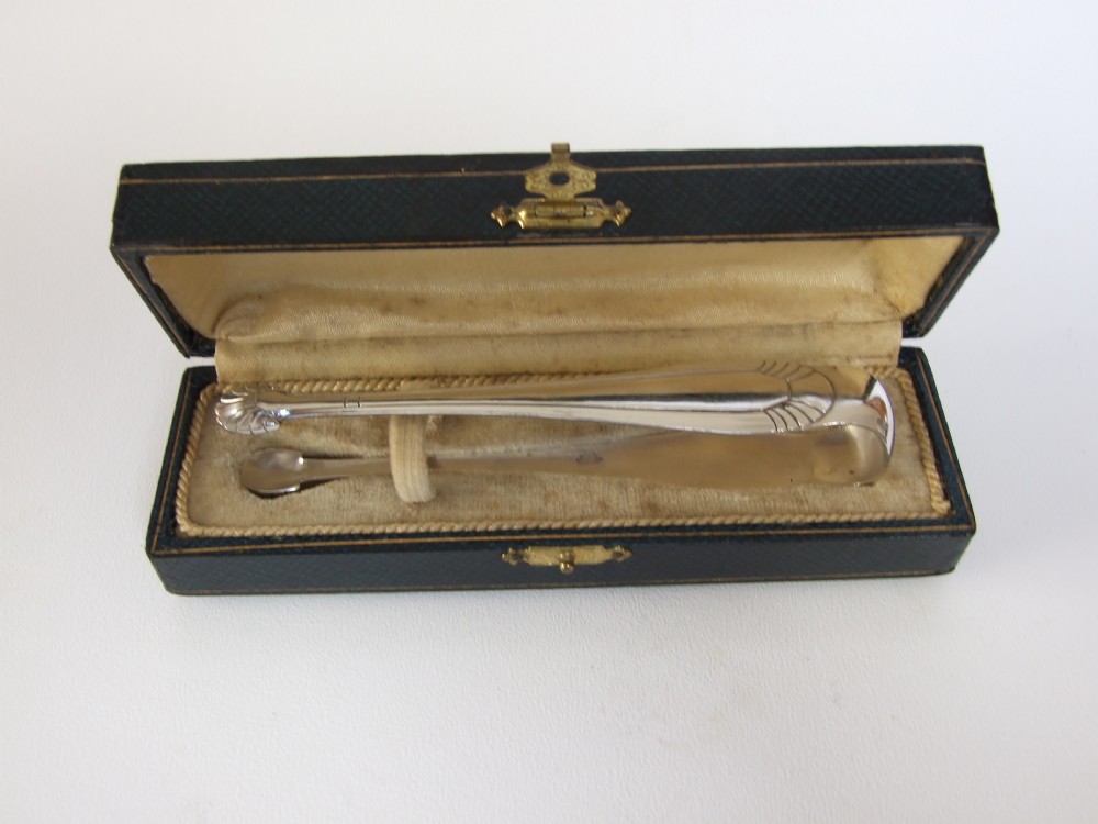 A splendid pair of French silver plated Art Deco tongs.