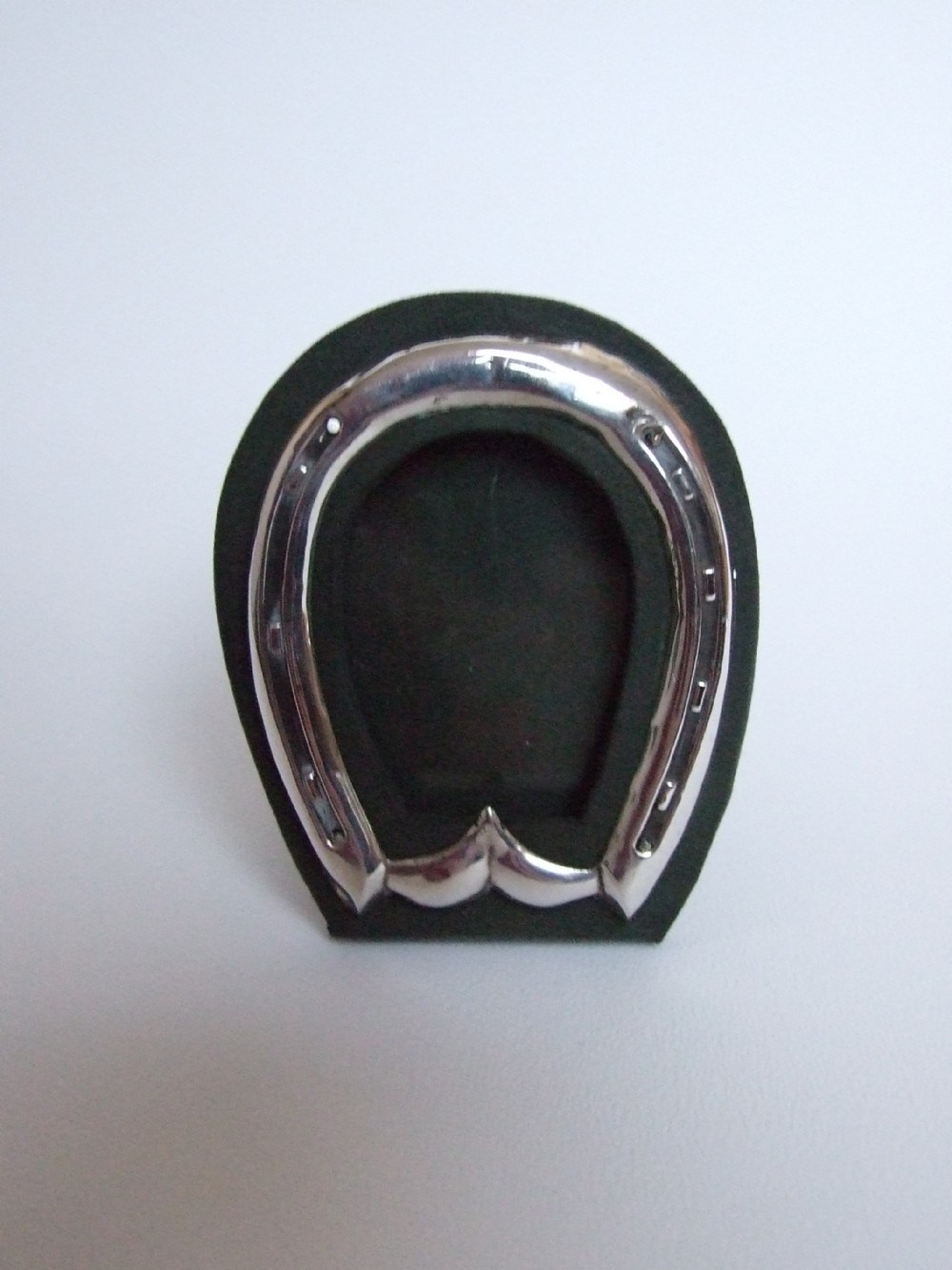 A lovely Victorian silver horseshoe photo frame.