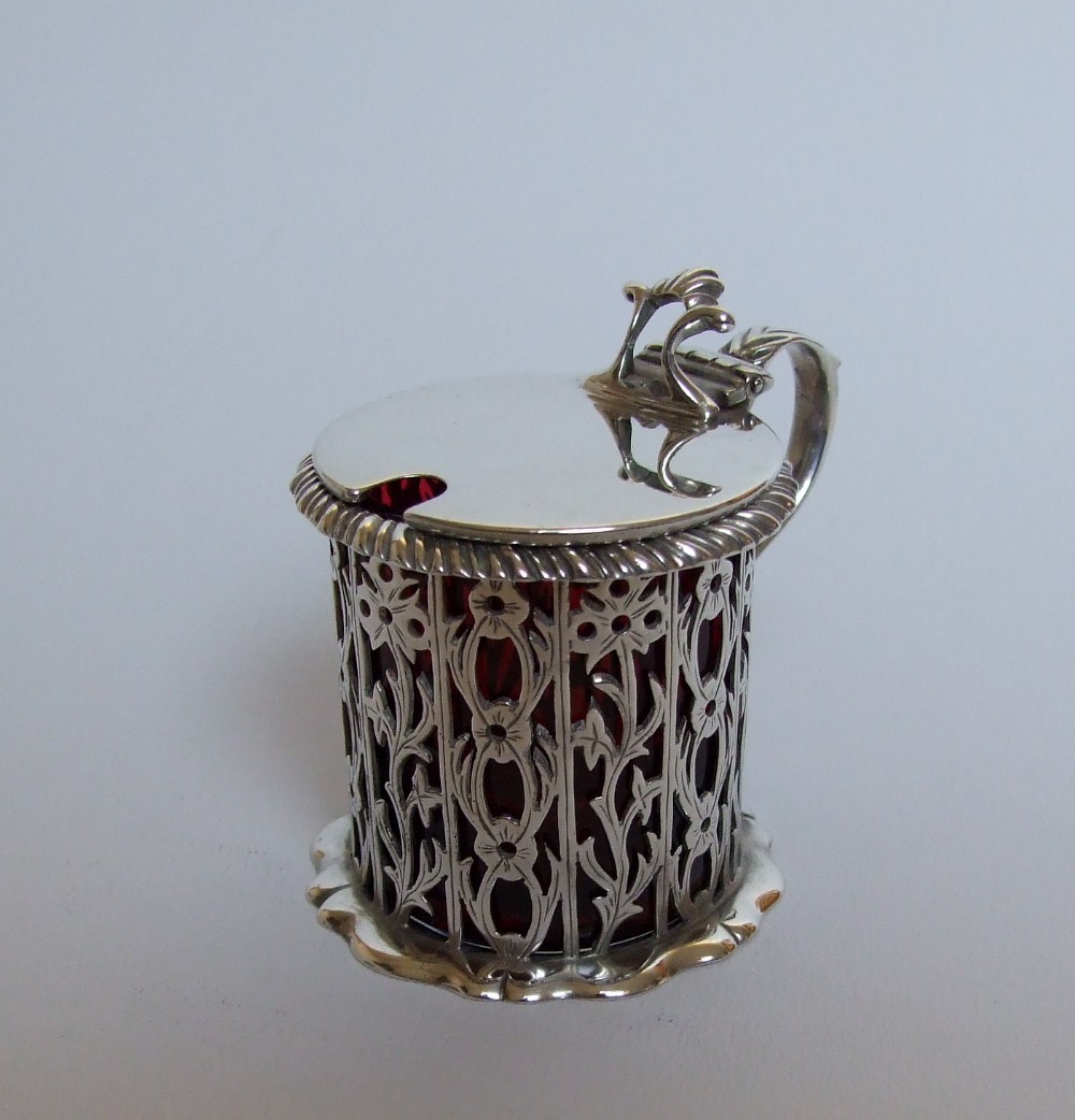 A wonderful Victorian silver & cranberry mustard pot.
