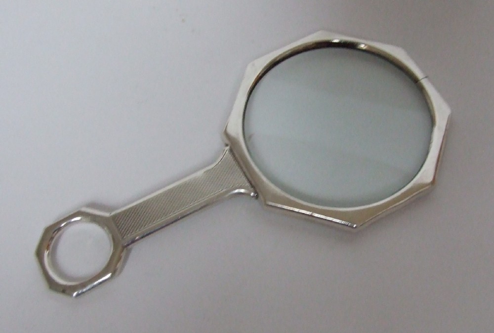 A handsome Art Deco silver magnifying glass.