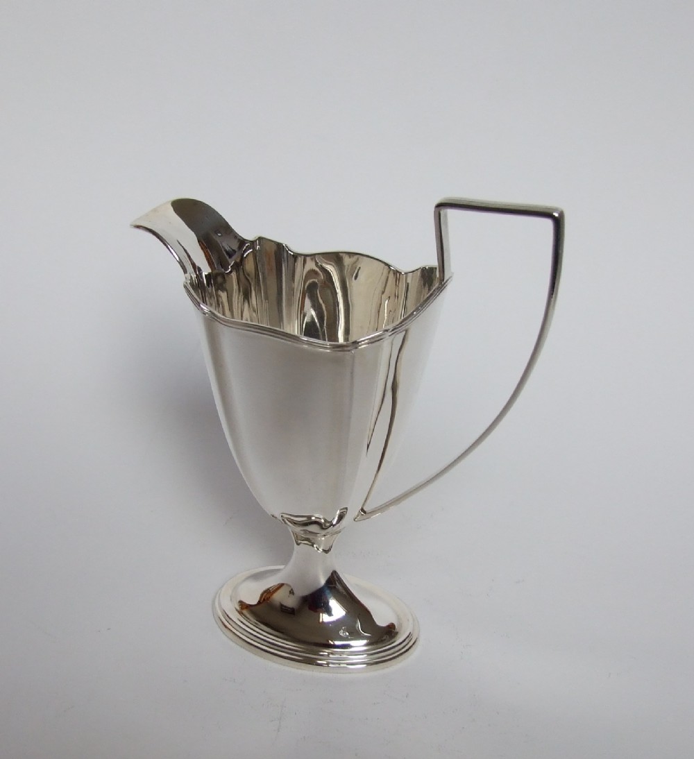 A good Edwardian silver cream jug.