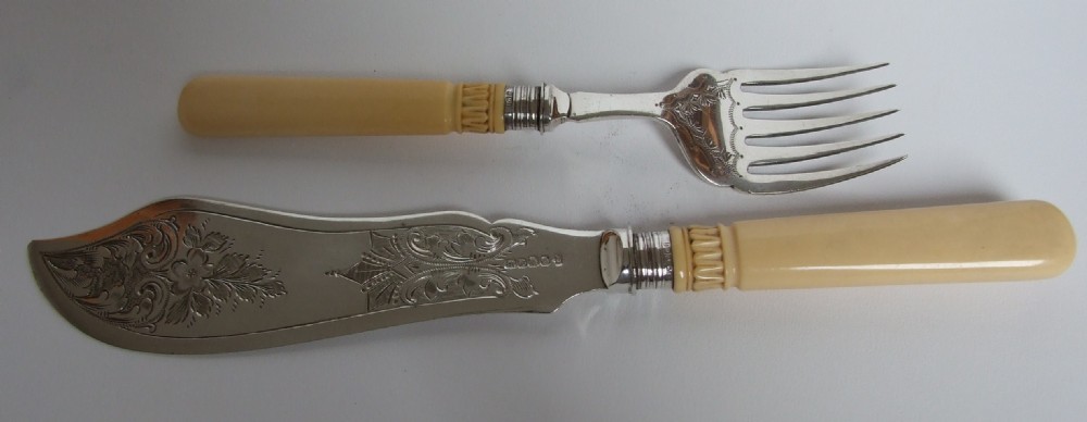 A handsome pair of Victorian silver plated fish servers.