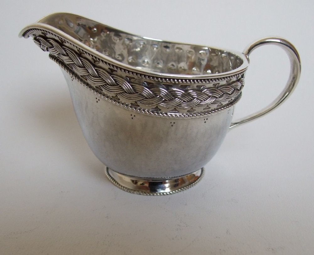 A Liberty Silver Arts & Crafts cream jug.