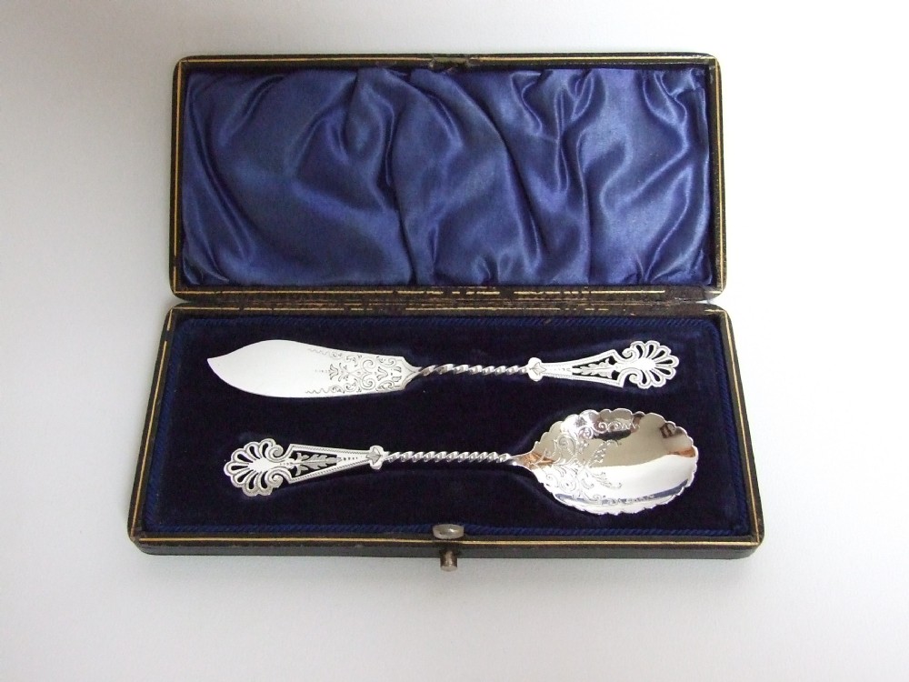 A wonderful pierced Victorian silver butter knife and preserve spoon.