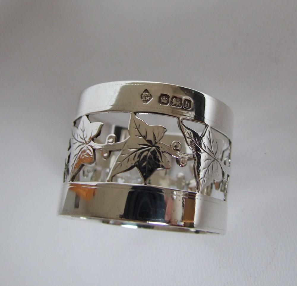 A superior Victorian pierced silver napkin ring.