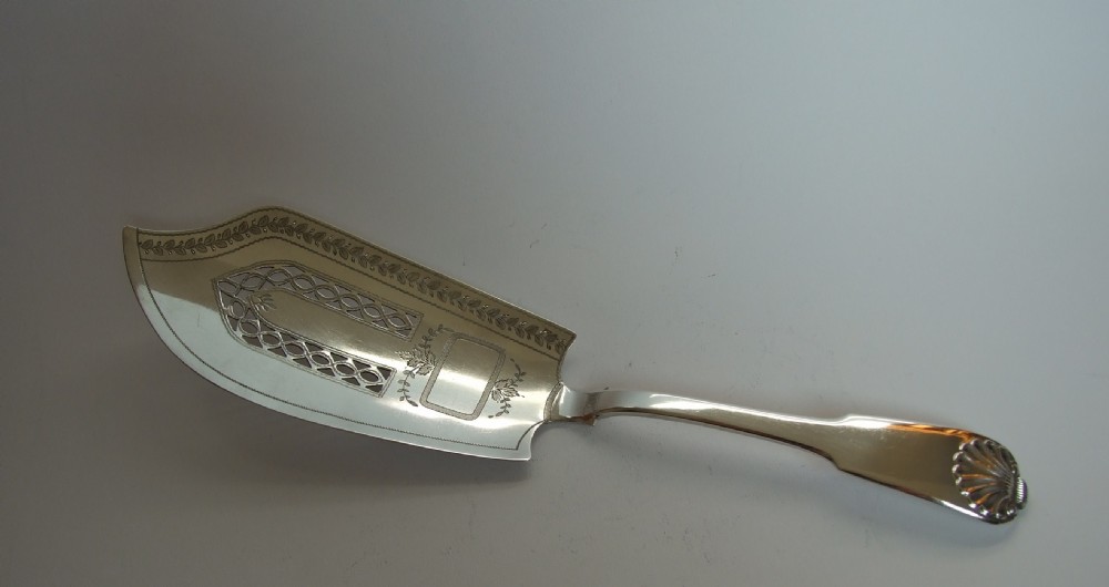 A handsome Georgian silver fish slice.