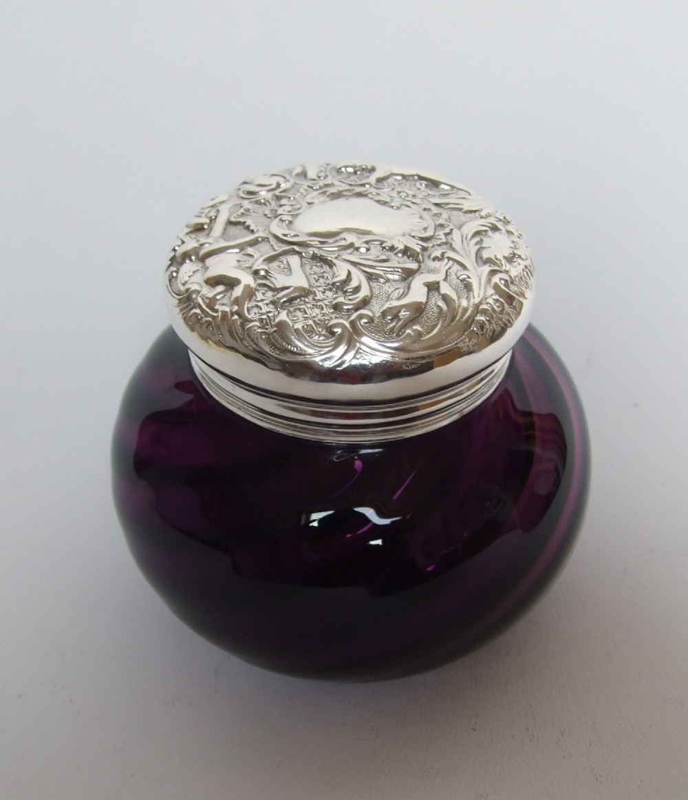 A gorgeous Victorian silver lidded powder bowl.