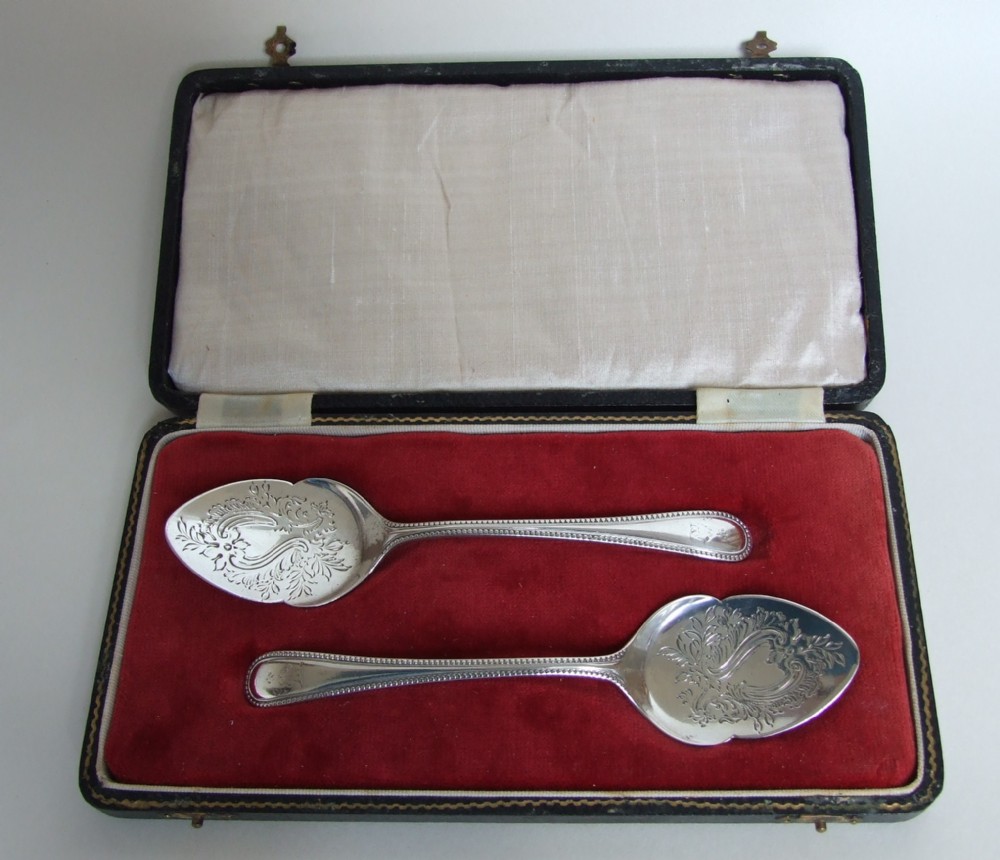 A handsome pair of Victorian silver preserve or ice cream spades.
