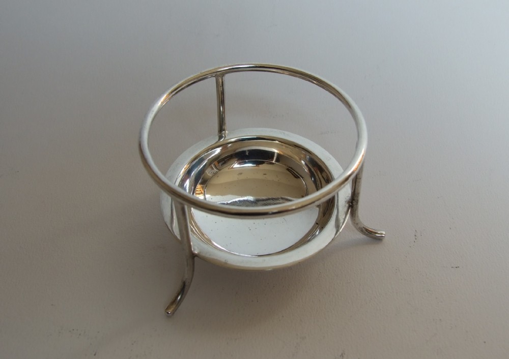 A sought after silver tea strainer drip cup.