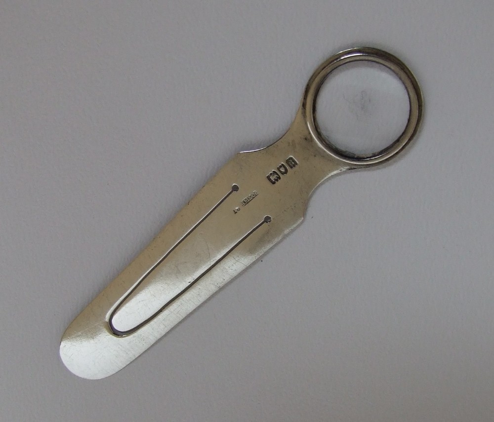 A rare Sampson Morden Victorian silver bookmark/magnifying glass.