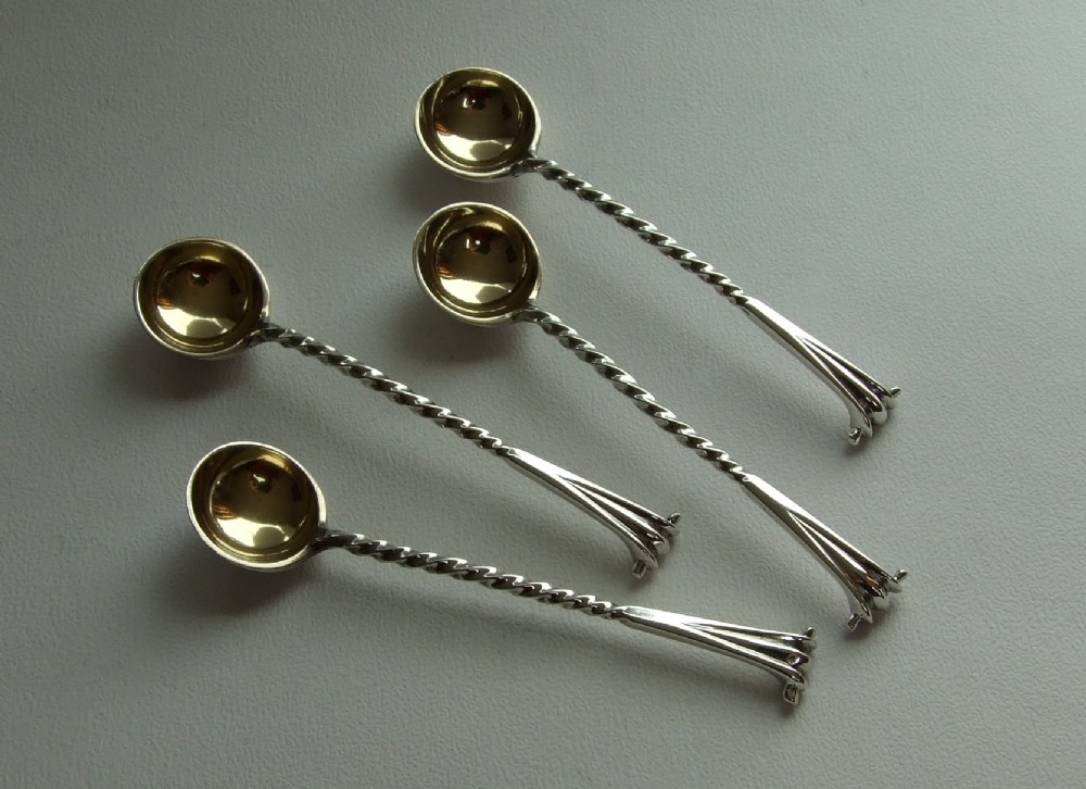 Rare set of four Onslow pattern Victorian silver condiment spoons.