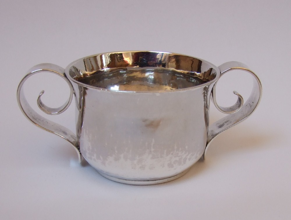 A fabulous Britannia standard silver Arts & Crafts porringer.