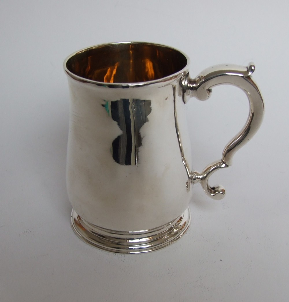 An extremely rare early 18th Century silver tankard.