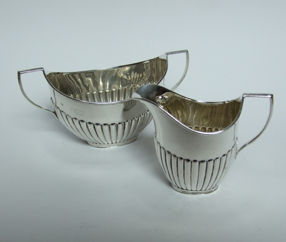A charming Victorian silver cream & sugar.