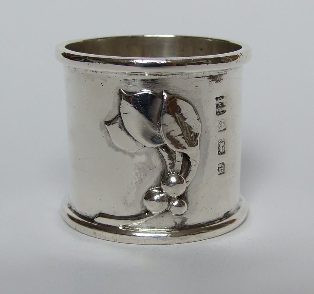 An amazing cast silver napkin ring.