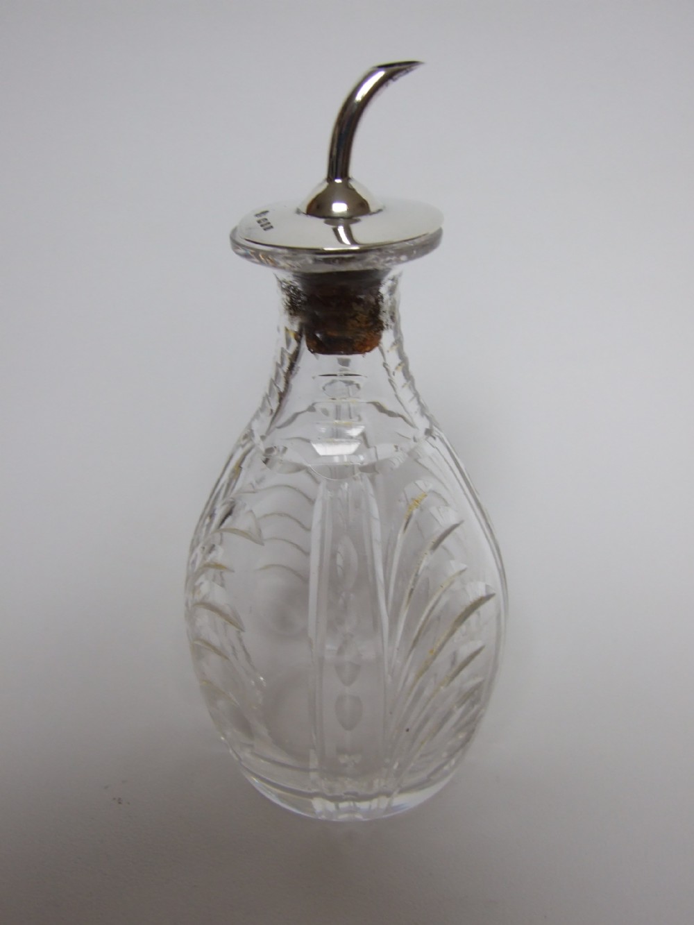 An attractive silver mounted bitters jigger.