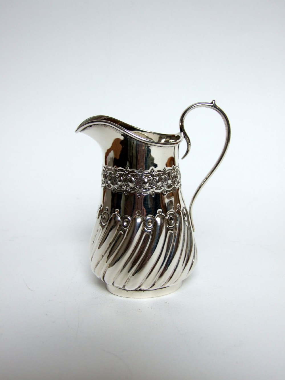 A lovely Victorian silver cream jug.