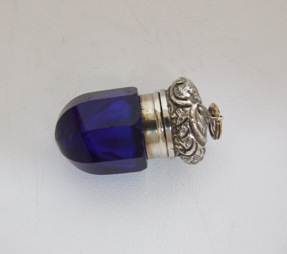 A rare Victorian acorn shaped, silver mounted vinaigrette.