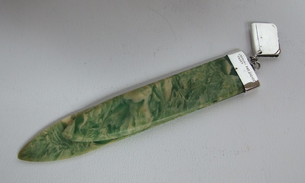 An unusual Art Deco Sterling silver & Bakelite bookmark.