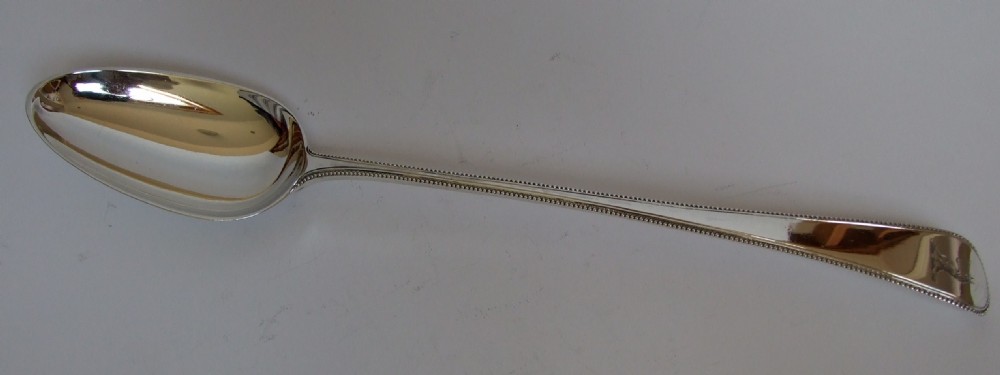 A superb 18th Century silver stuffing/basting spoon.