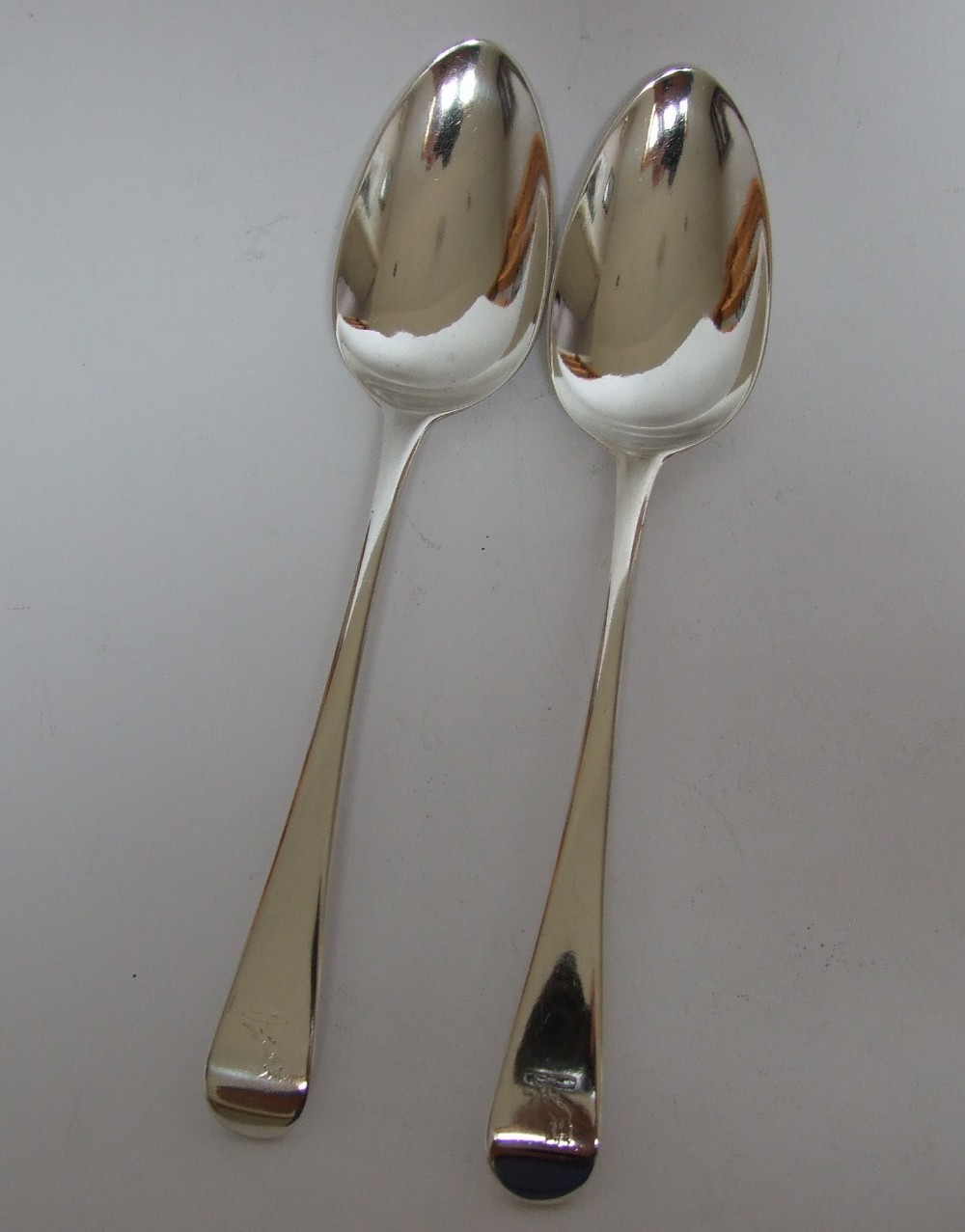 A fabulous pair of 18th Century silver serving/tablespoons.