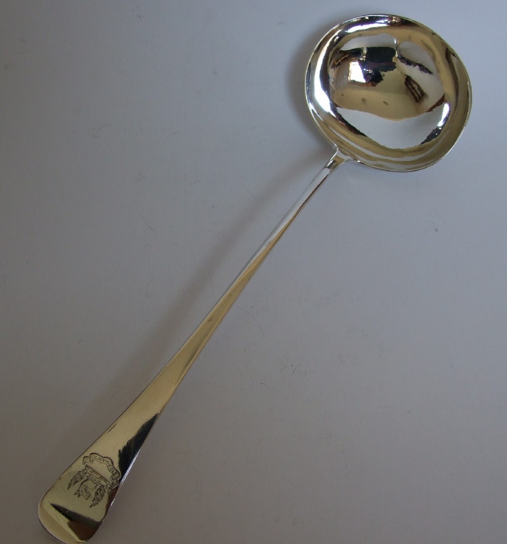 A wonderful Georgian silver soup ladle.