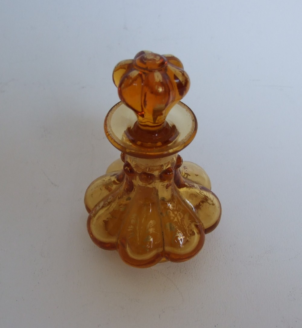 A gorgeous Victorian amber scent bottle.