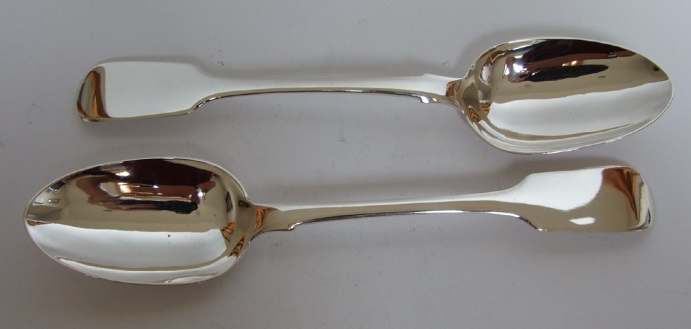 A handsome pair of early Victorian silver serving spoons.