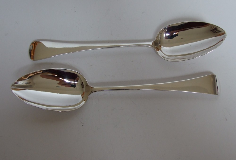 Handsome pair of George III silver serving spoons.
