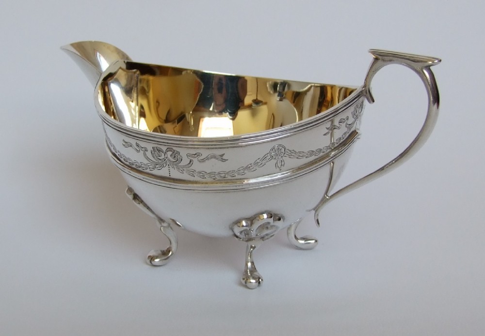A superb Edwardian silver gilt cream boat.