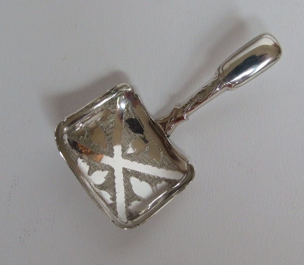 A gorgeous George IV silver caddy spoon.