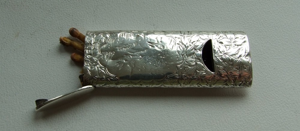 An extremely rare Victorian silver whistle/vesta combination.