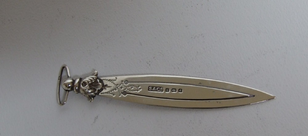 An unusual Edwardian silver bookmark with acanthus terminal.