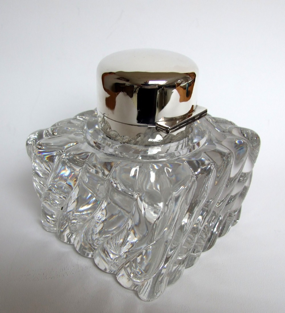 A magnificent Victorian silver mounted glass inkwell & paperweight. 