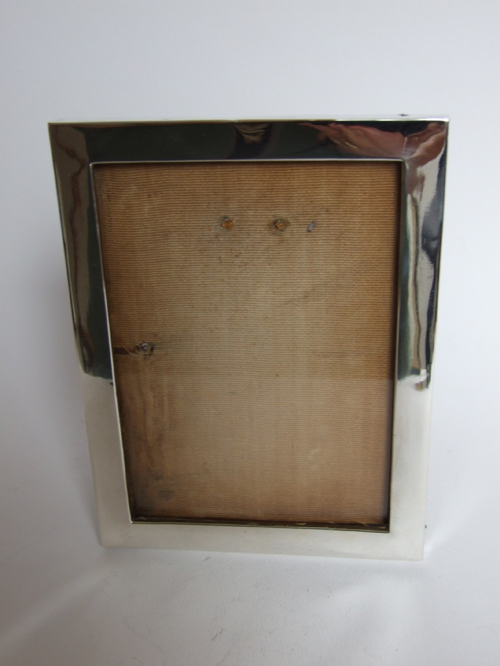 A useful rectangular silver photo frame.