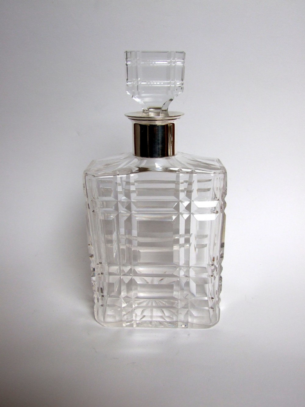 A fabulous German Art Deco silver mounted decanter.