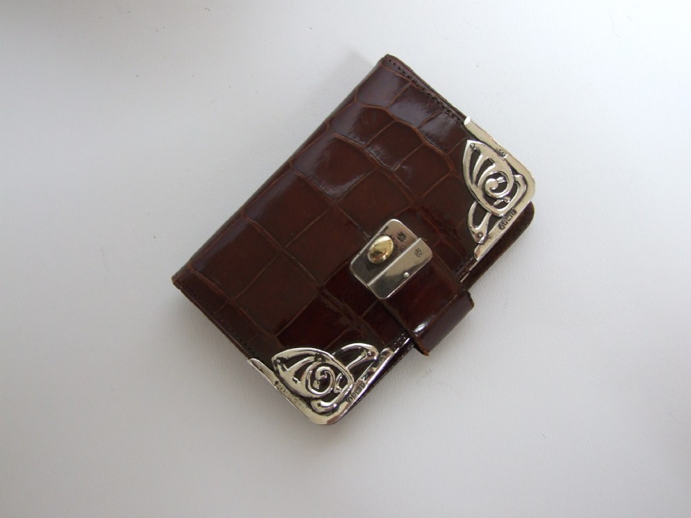 A lovely Edwardian silver mounted crocodile purse/wallet.