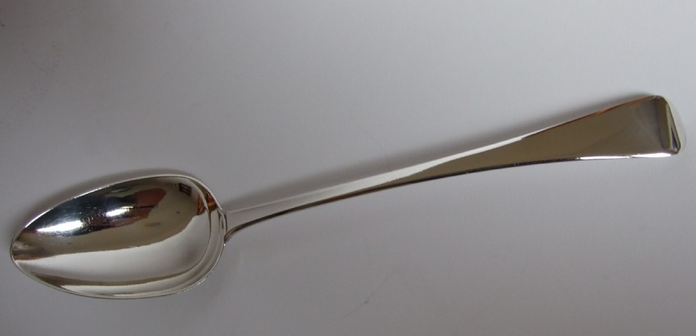 A handsome Georgian silver stuffing/basting spoon.