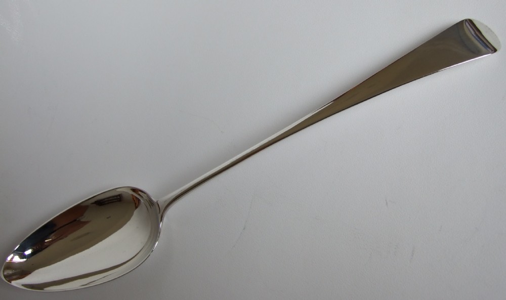 A handsome 18th Century silver stuffing/basting spoon.