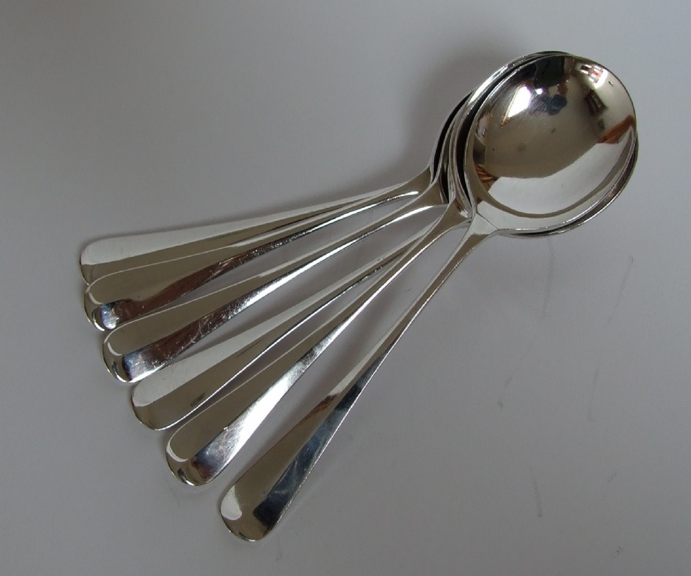 A set of six silver plated rat-tail soup spoons.
