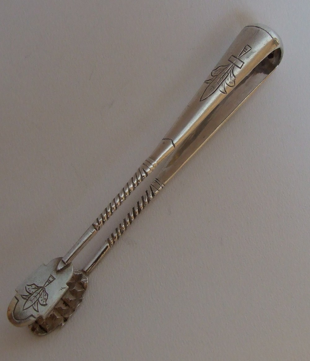 A gorgeous pair of pre-revolution Russian silver tongs.