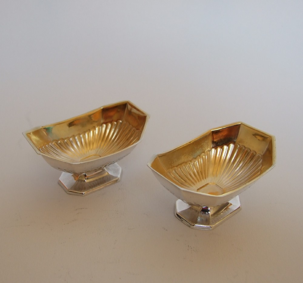 A charming pair of Victorian silver gilt salt tubs.