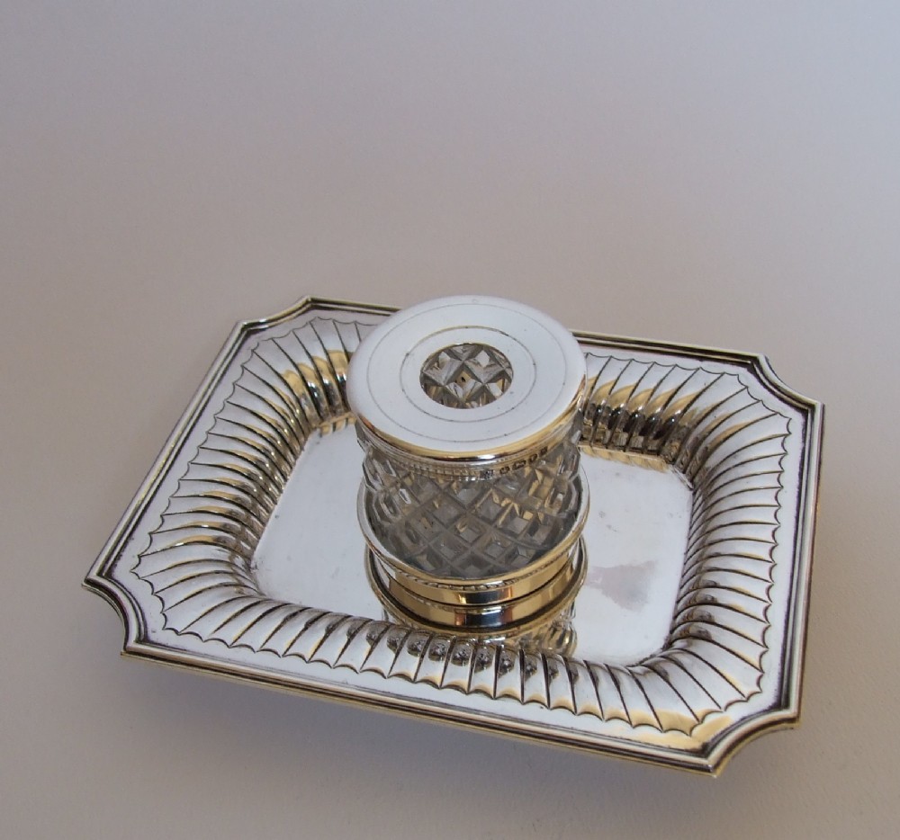 A handsome Victorian silver desk inkwell.