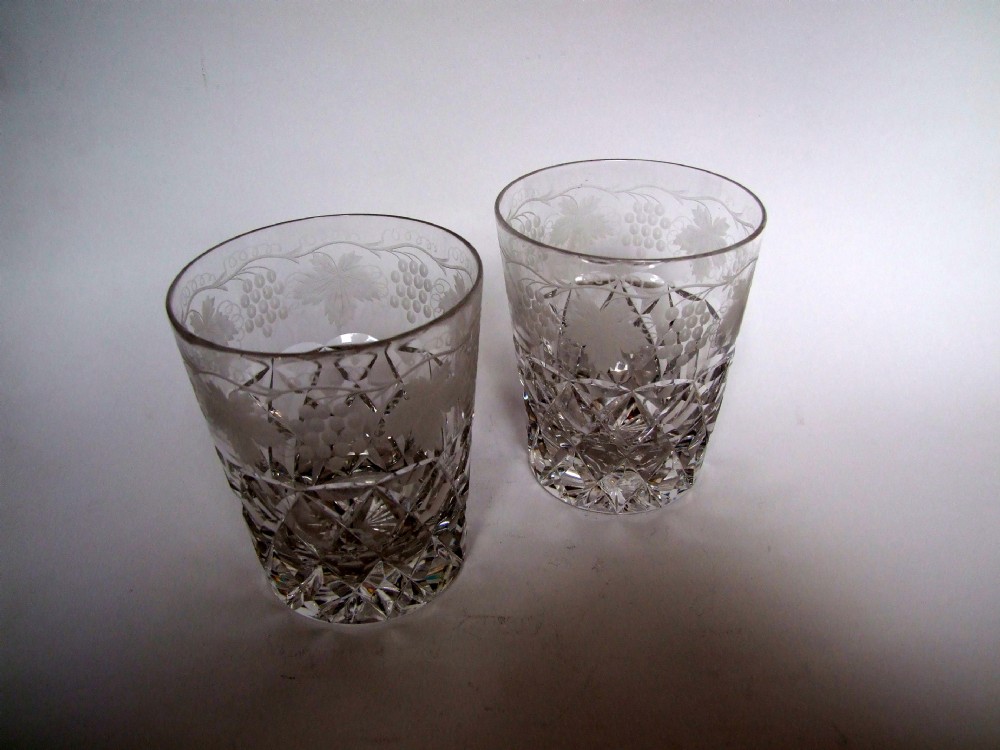 A stunning pair of Victorian cut & engraved whisky tumblers.