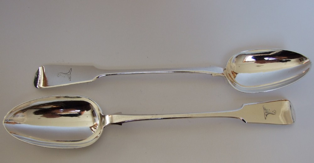 A rare pair of Newcastle silver stuffing/basting spoons