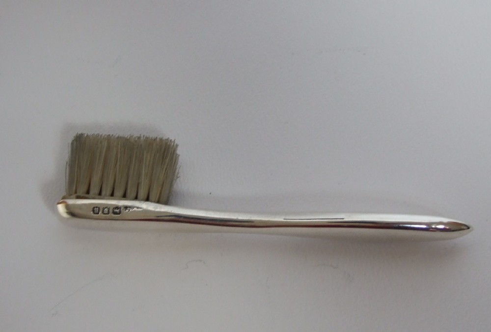 A charming silver moustache brush form the First World War.